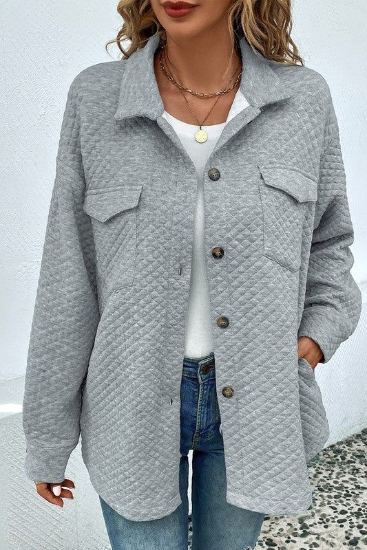 Grey quilted jacket.