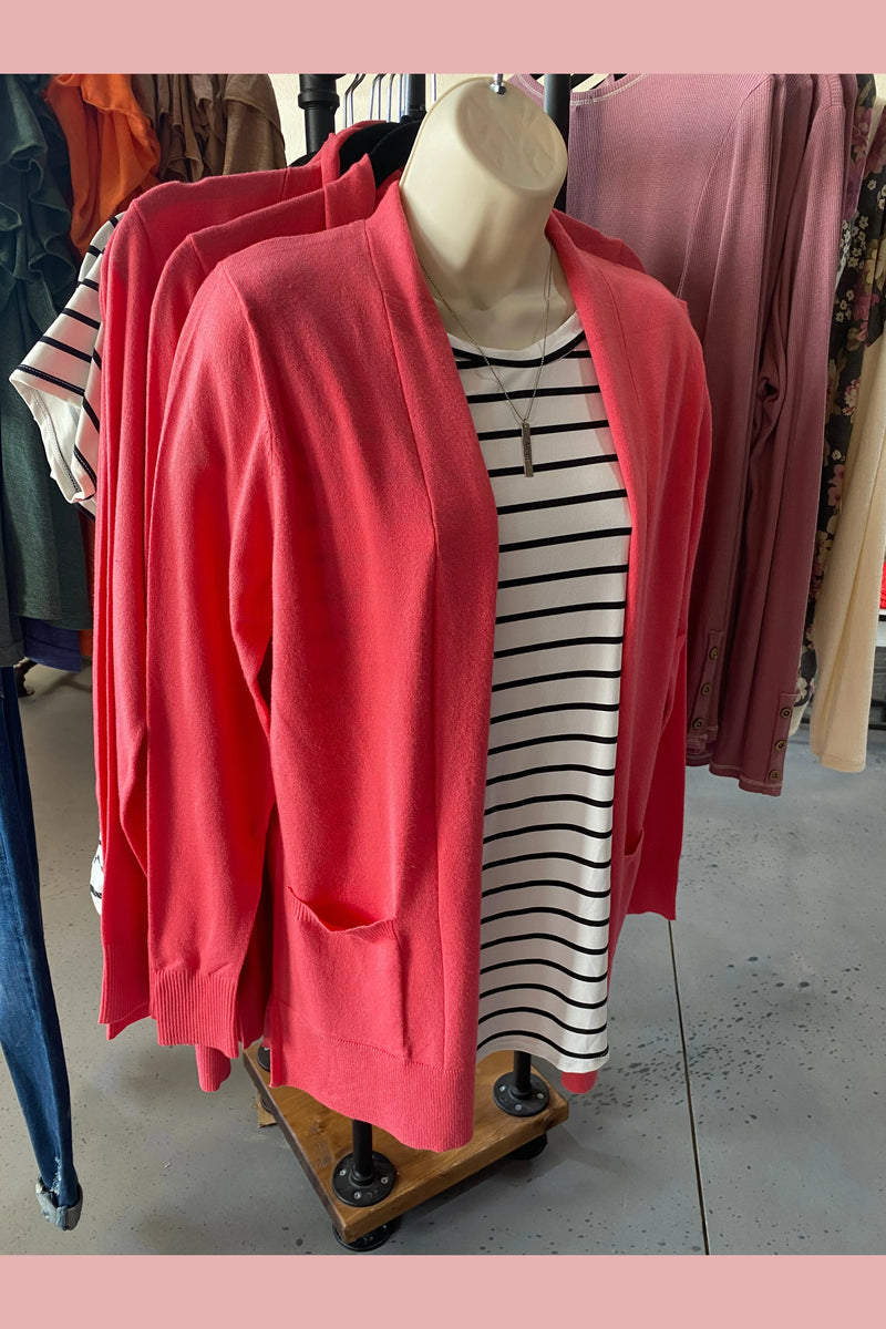 Coral open front cardigan with pockets. 