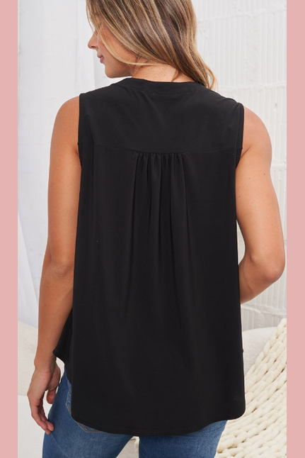 Sleeveless solid knit blouse