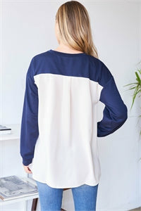 Navy and ivory color splicing top. 