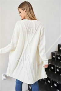 Ivory acrylic cardigan with pockets. 
