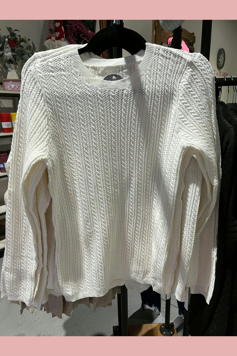 Ivory lightweight transition sweater. 