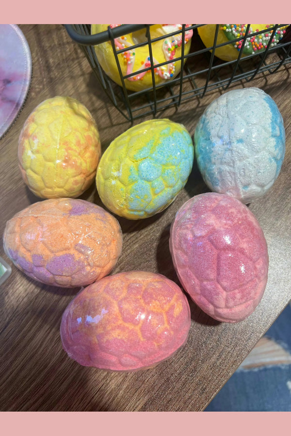Dino egg bath bombs with a surprise inside. 