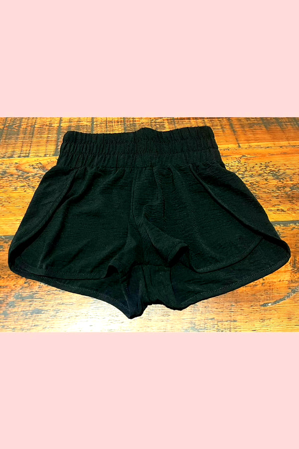 Front of black active shorts without liner.