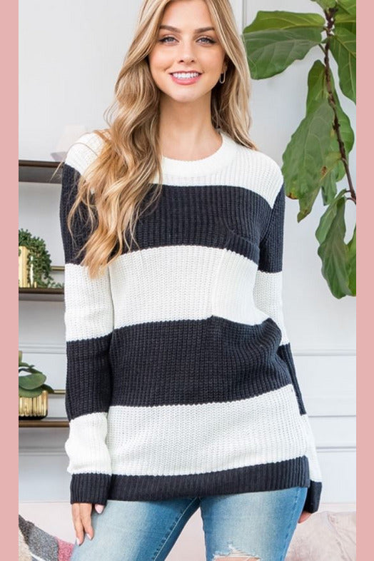Black and ivory knit sweater. 